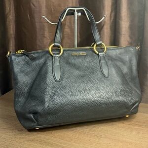 Miu Miu authentic Black Leather Tote with Gold Hardware strap . Two way bag